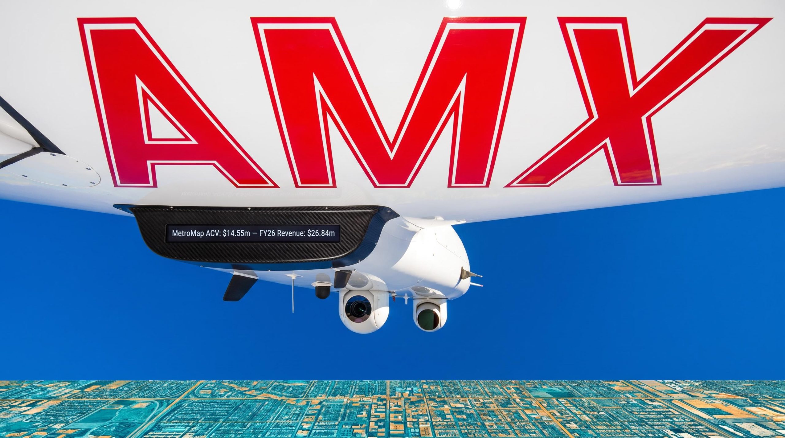 AMX plane and city