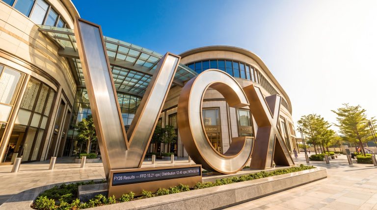 Large VCX letters outside building