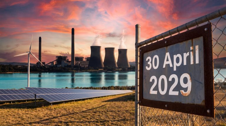 Eraring coal plant at sunset beside solar panels and a closure-date sign, illustrating the Australia power grid transition