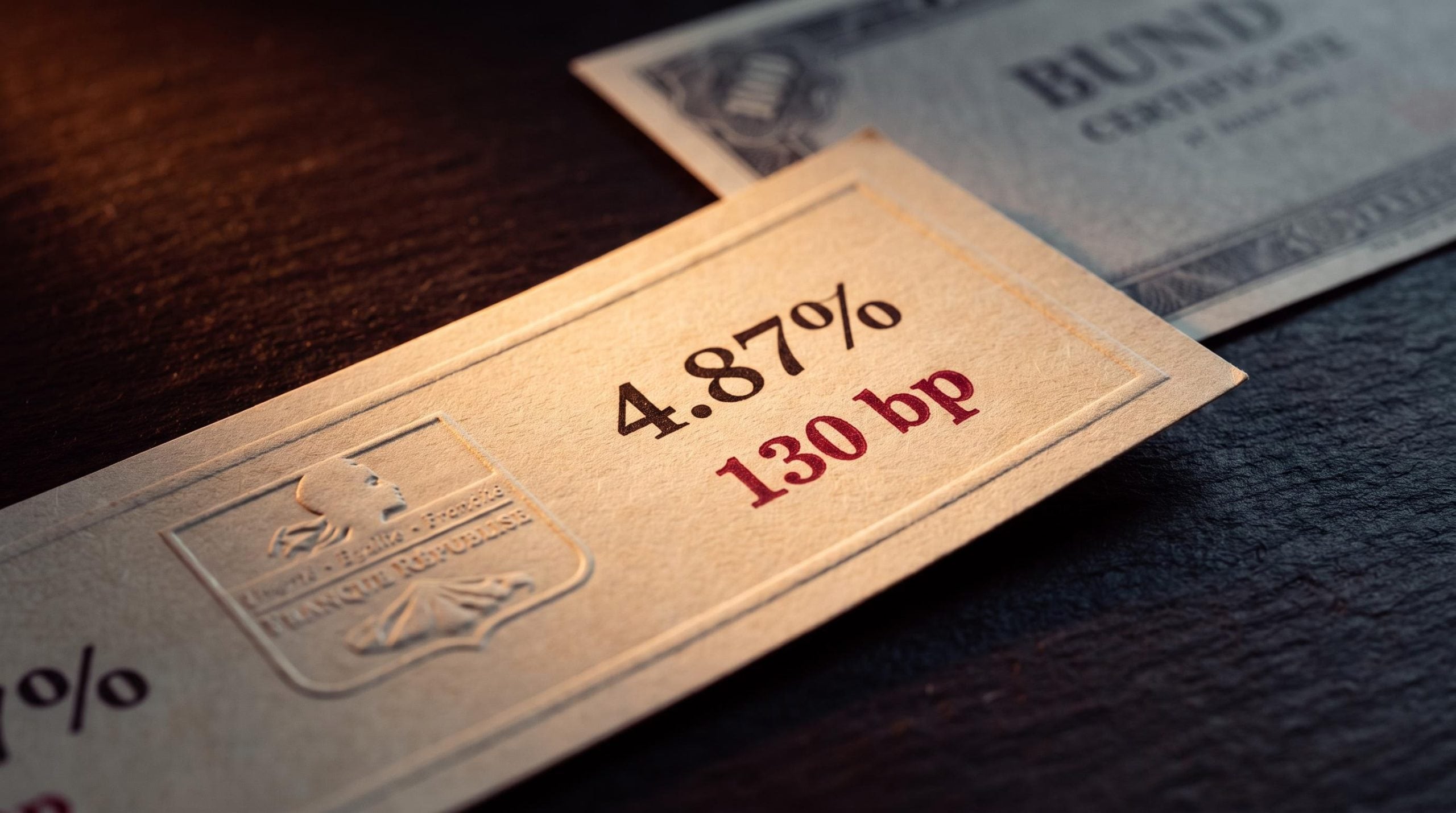 French OAT bond certificate stamped 4.87% and 130bp spread, France fiscal crisis repricing at 2012 crisis levels
