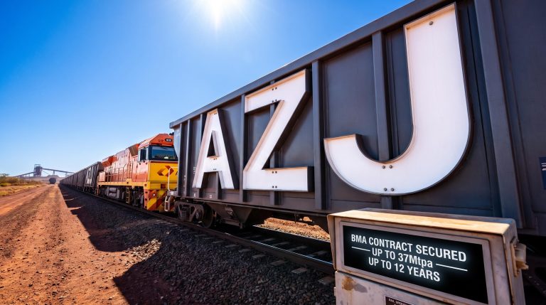 Freight train in desert landscape