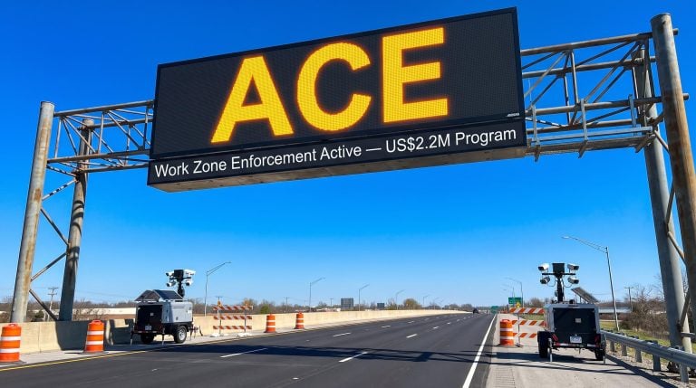Work zone enforcement sign