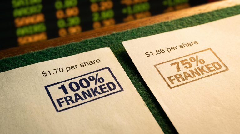 NAB vs ANZ dividend statements side by side showing 100% vs 75% franking credit difference for income investors