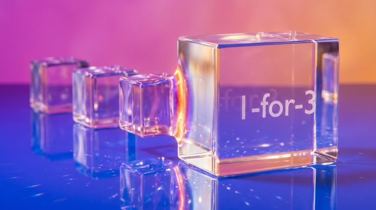 Three glass crystals fusing into one larger crystal etched "1-for-3", illustrating stock splits explained