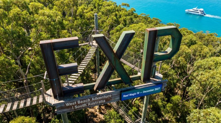 EXP sign with forest view