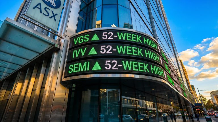 VGS, IVV, and SEMI ASX ETFs display 52-week highs on illuminated market ticker board